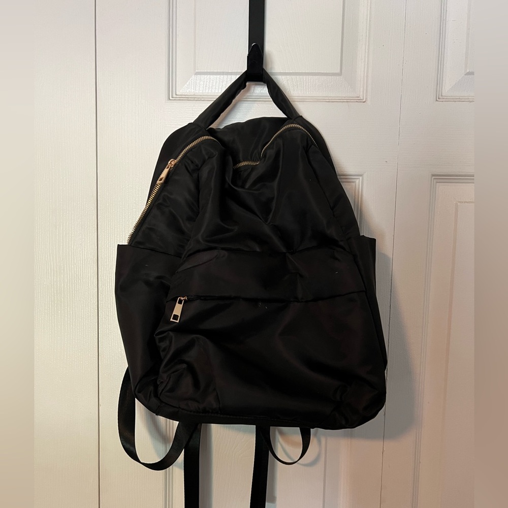 Target bookbag, used twice, gold and black